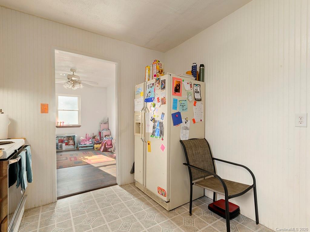 60 Sharptown Road Canton, NC 28716 - Photo 4 of 12 a view of a hallway with workspace and a couch