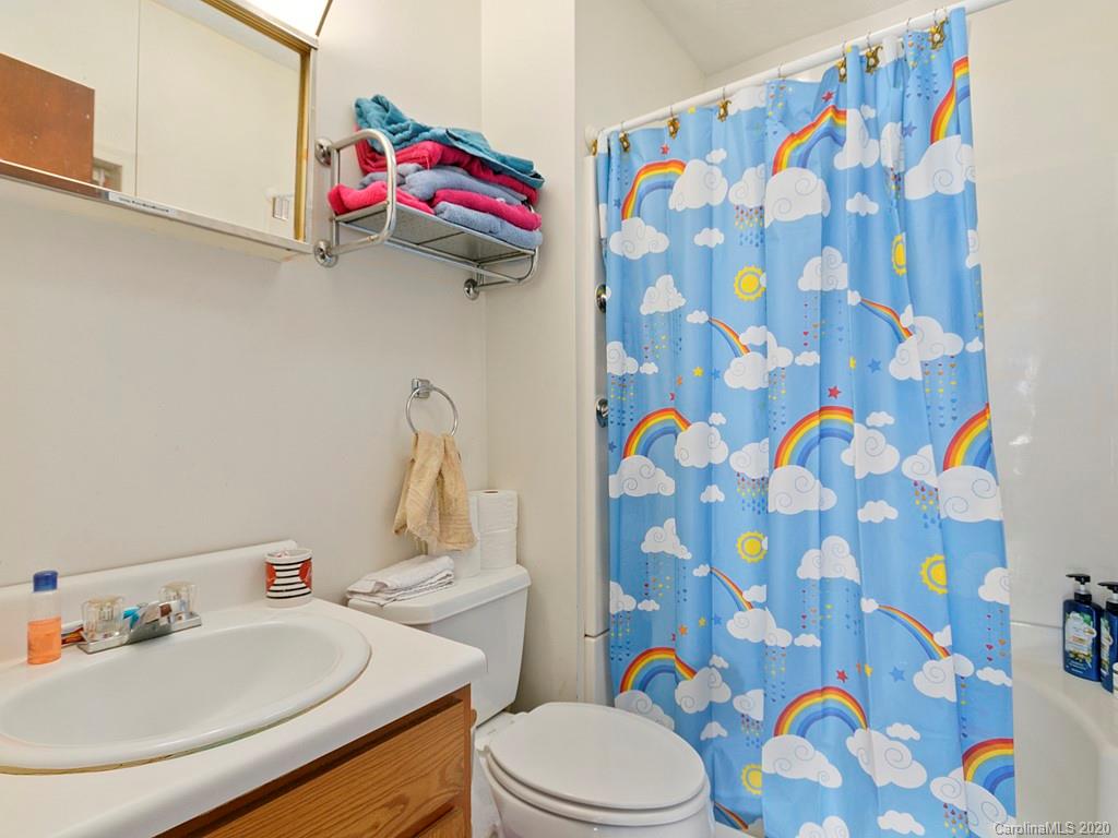 60 Sharptown Road Canton, NC 28716 - Photo 8 of 12 a bathroom with a sink and a toilet