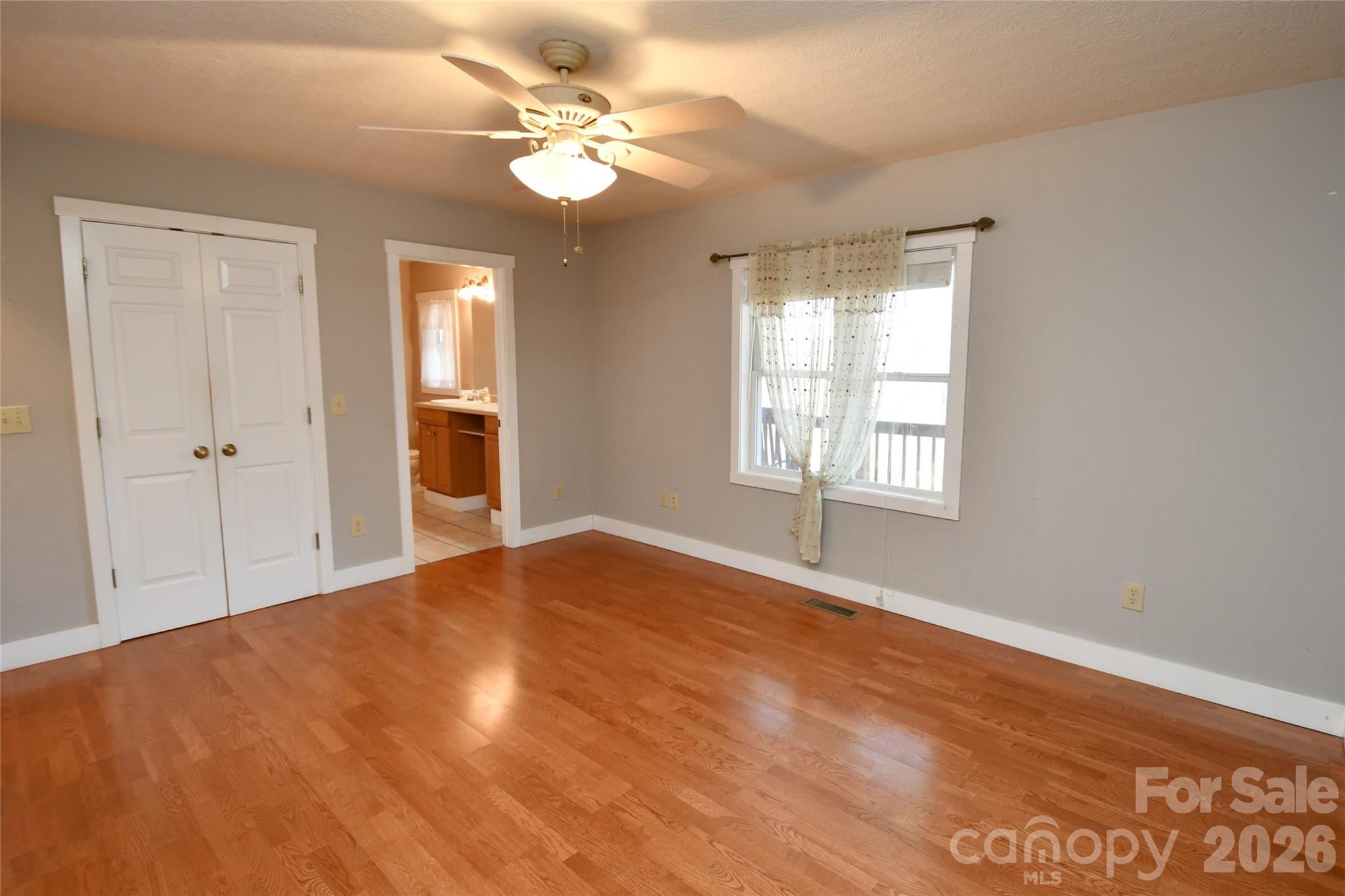 477 West Ridge Drive Burnsville, NC 28714 - Photo 19 of 48 a view of an empty room with a window