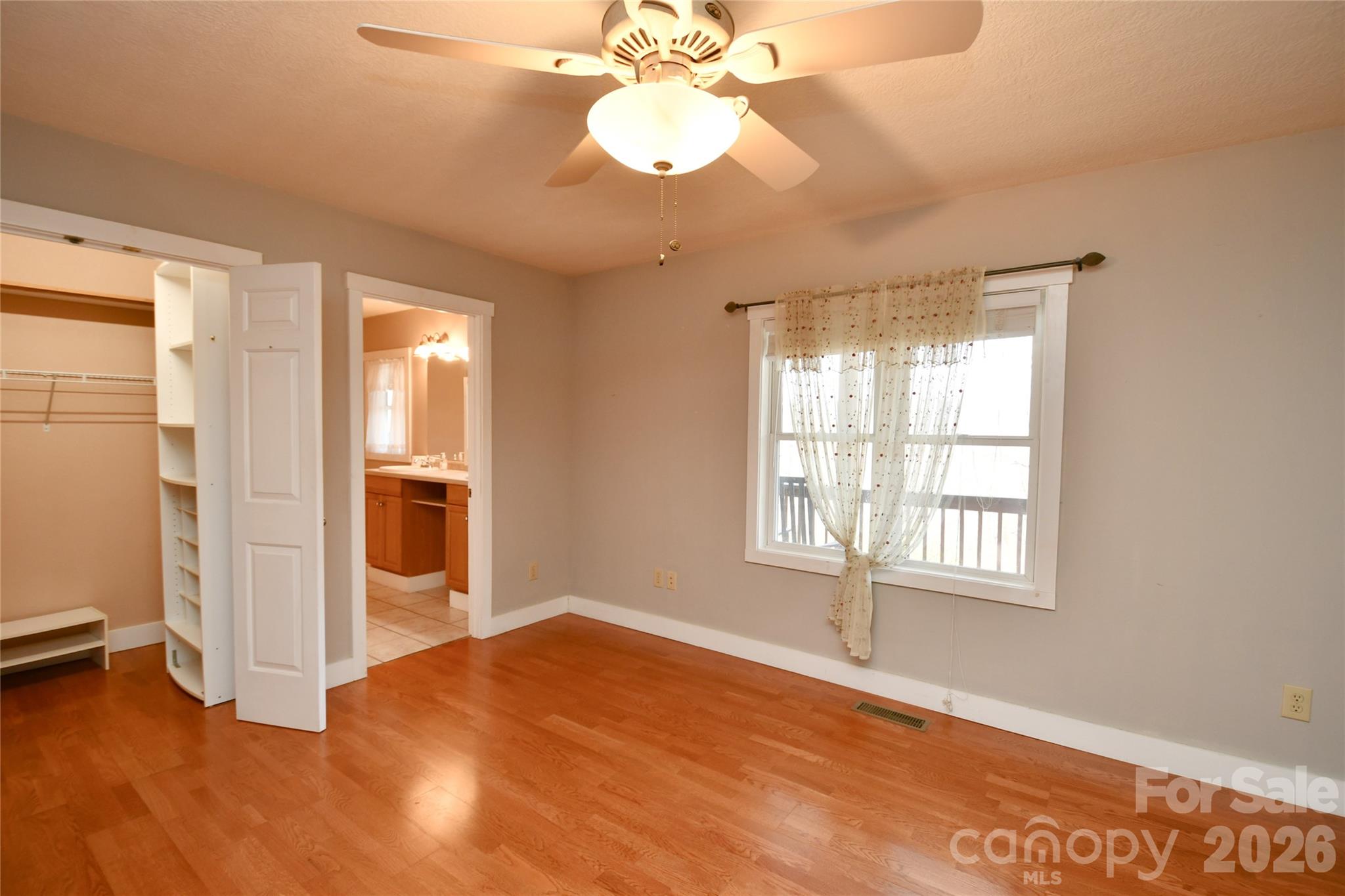 477 West Ridge Drive Burnsville, NC 28714 - Photo 21 of 48 a view of an empty room with a window