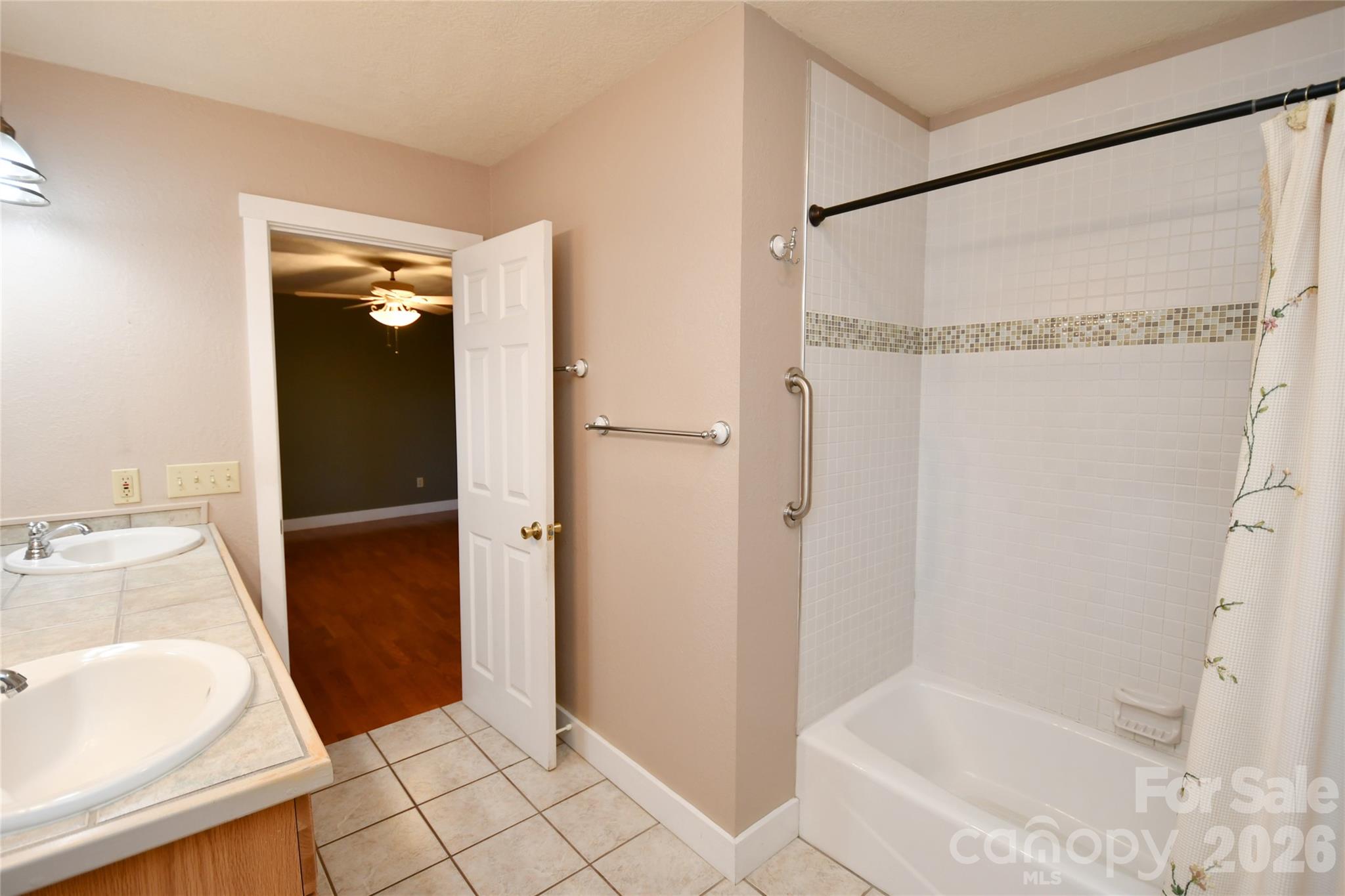 477 West Ridge Drive Burnsville, NC 28714 - Photo 26 of 48 a bathroom with a sink and a shower