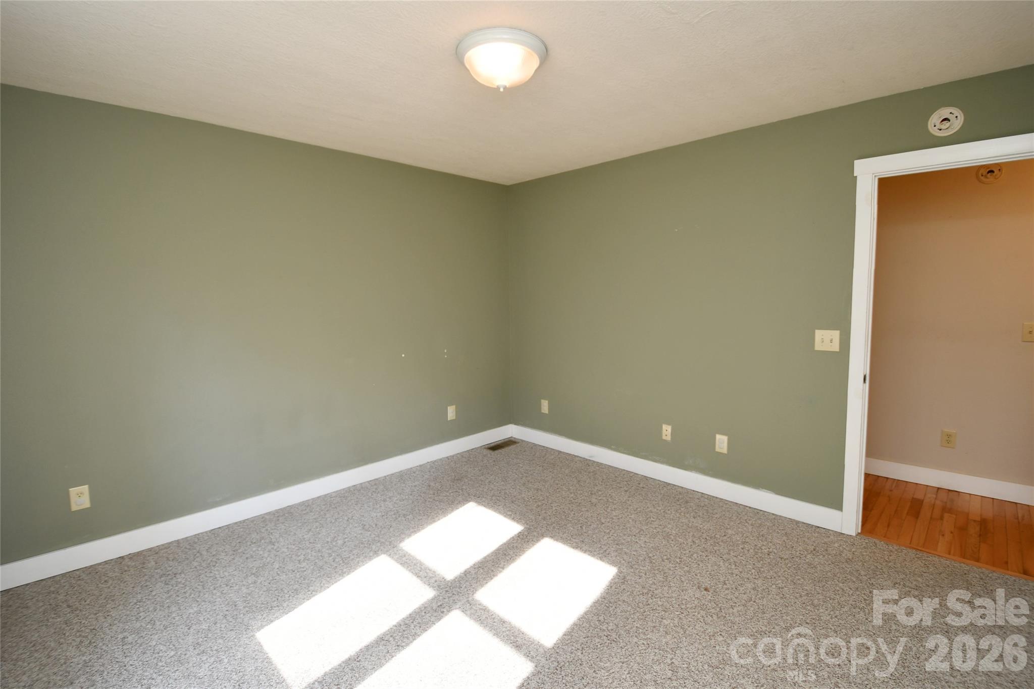 477 West Ridge Drive Burnsville, NC 28714 - Photo 30 of 48 an empty room with windows