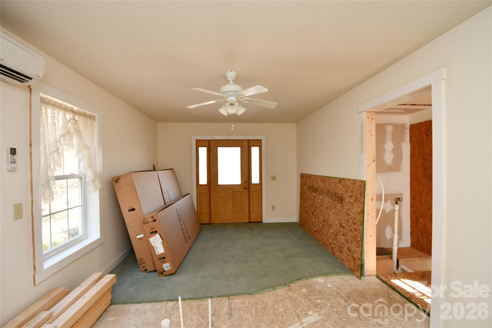 477 West Ridge Drive Burnsville, NC 28714 - Photo 43 of 48 a view of livingroom with furniture and window