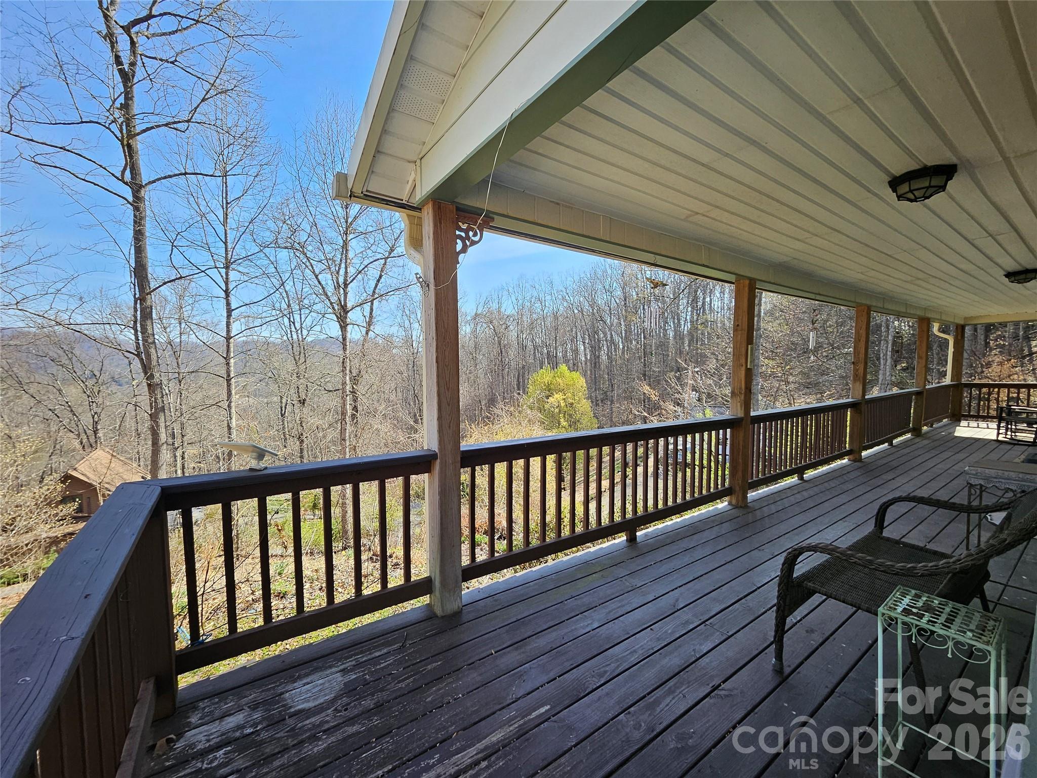477 West Ridge Drive Burnsville, NC 28714 - Photo 5 of 48 a view of balcony with wooden floor