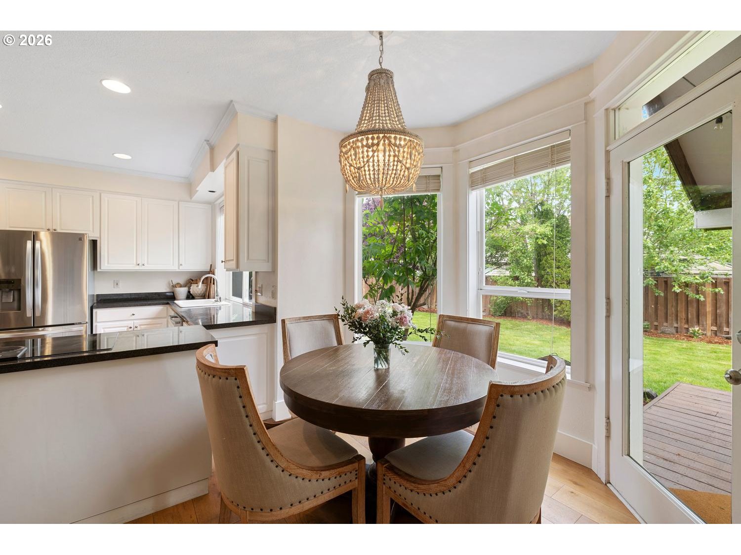 2519 Northwest 24th Circle Camas, WA 98607 - Photo 22 of 48 a dining room with furniture a chandelier and wooden floor