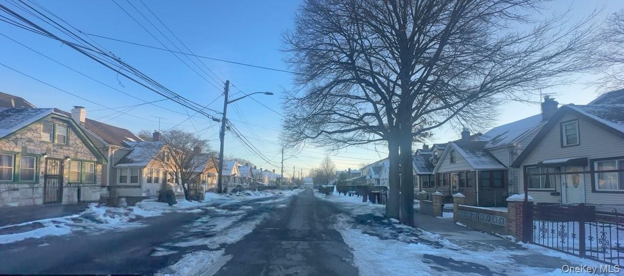 104-14 214th Street Queens, NY 11429 - Photo 4 of 4 a view of a house with a yard