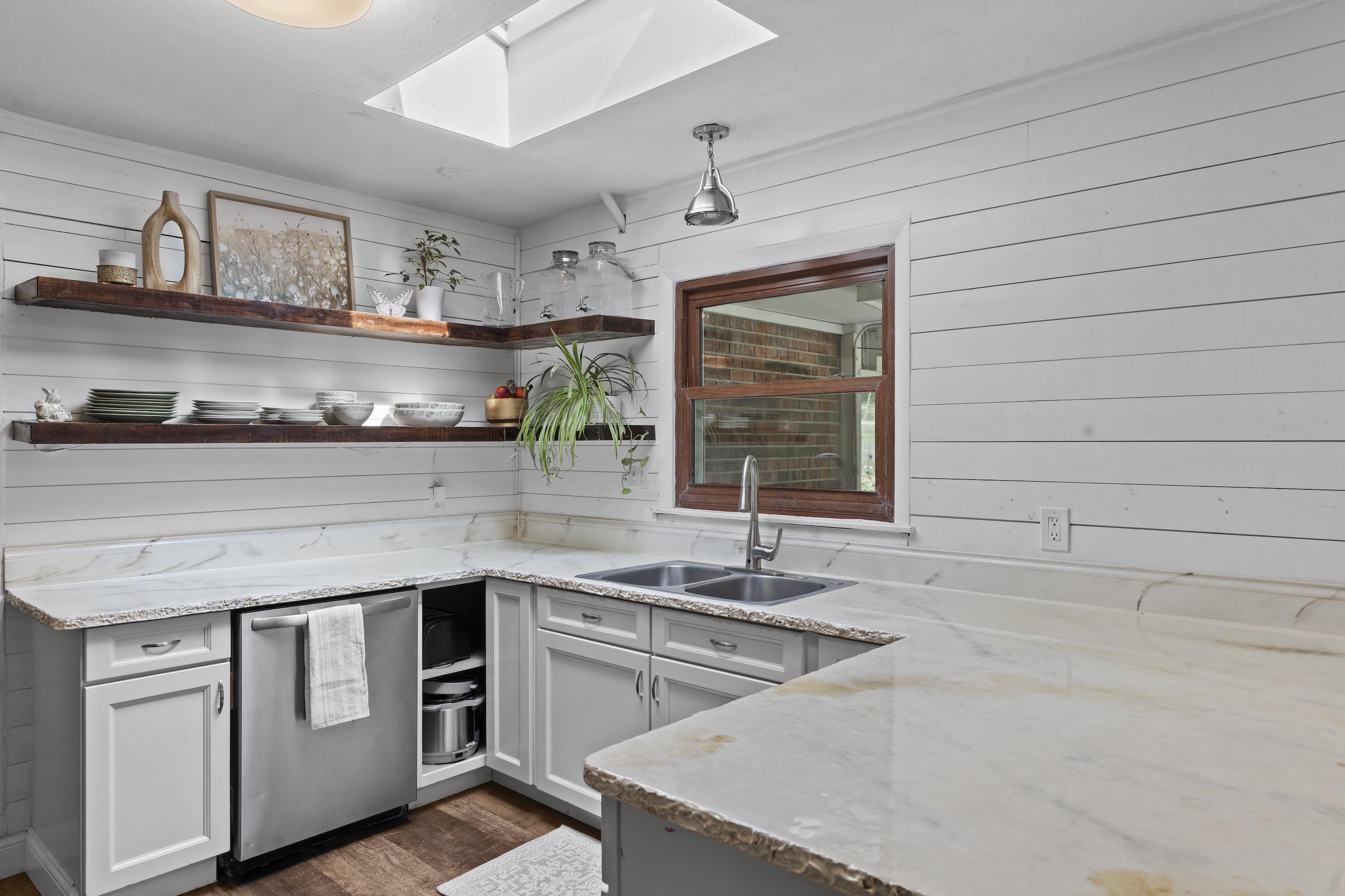 N8093 Lakeview Road Oconomowoc, WI 53066 - Photo 12 of 44 Ample counter space & sky light in your new kitchen!