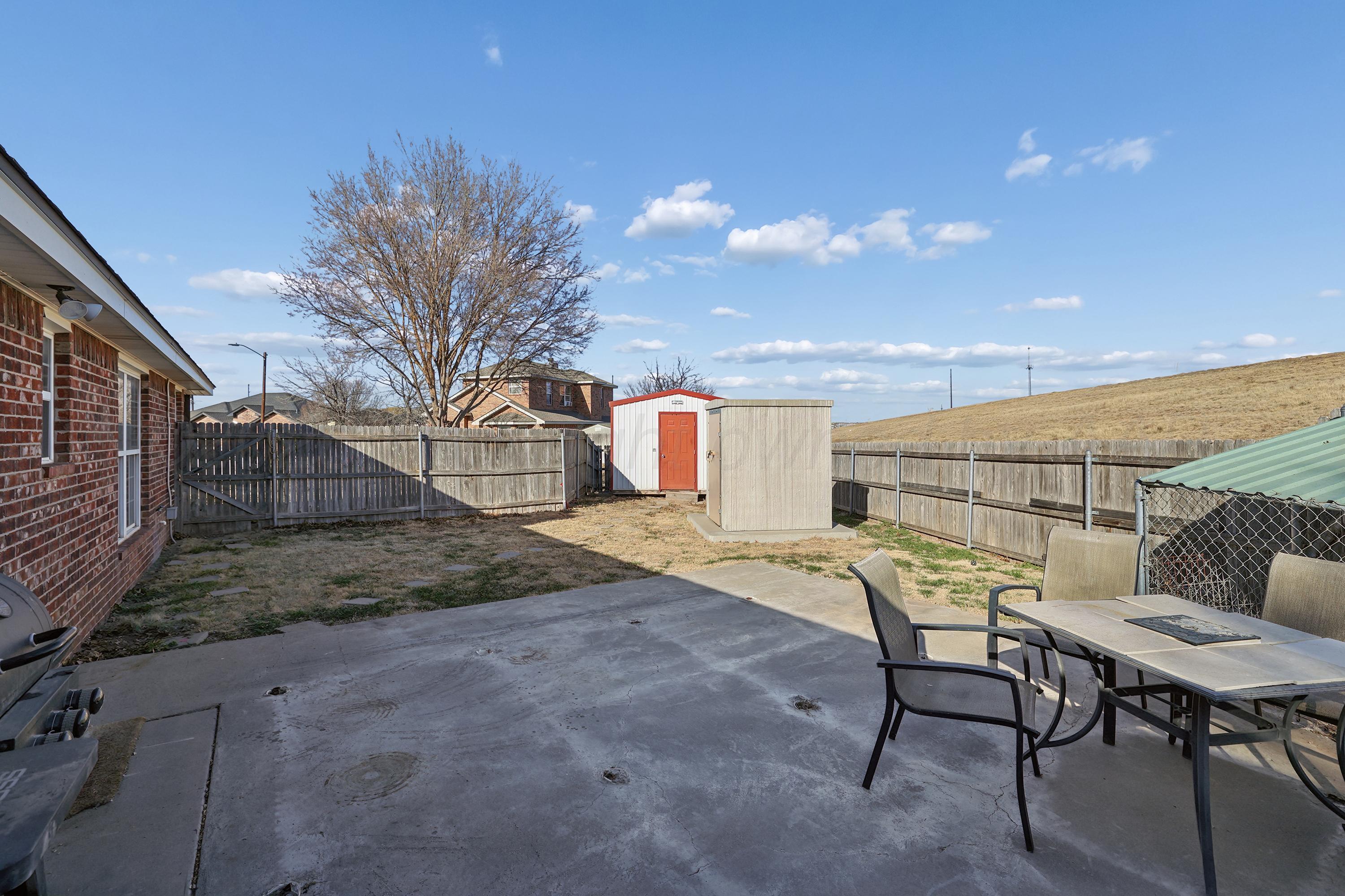 1401 Southwest 61st Avenue Amarillo, TX 79118 - Photo 21 of 31 26-Side Yard
