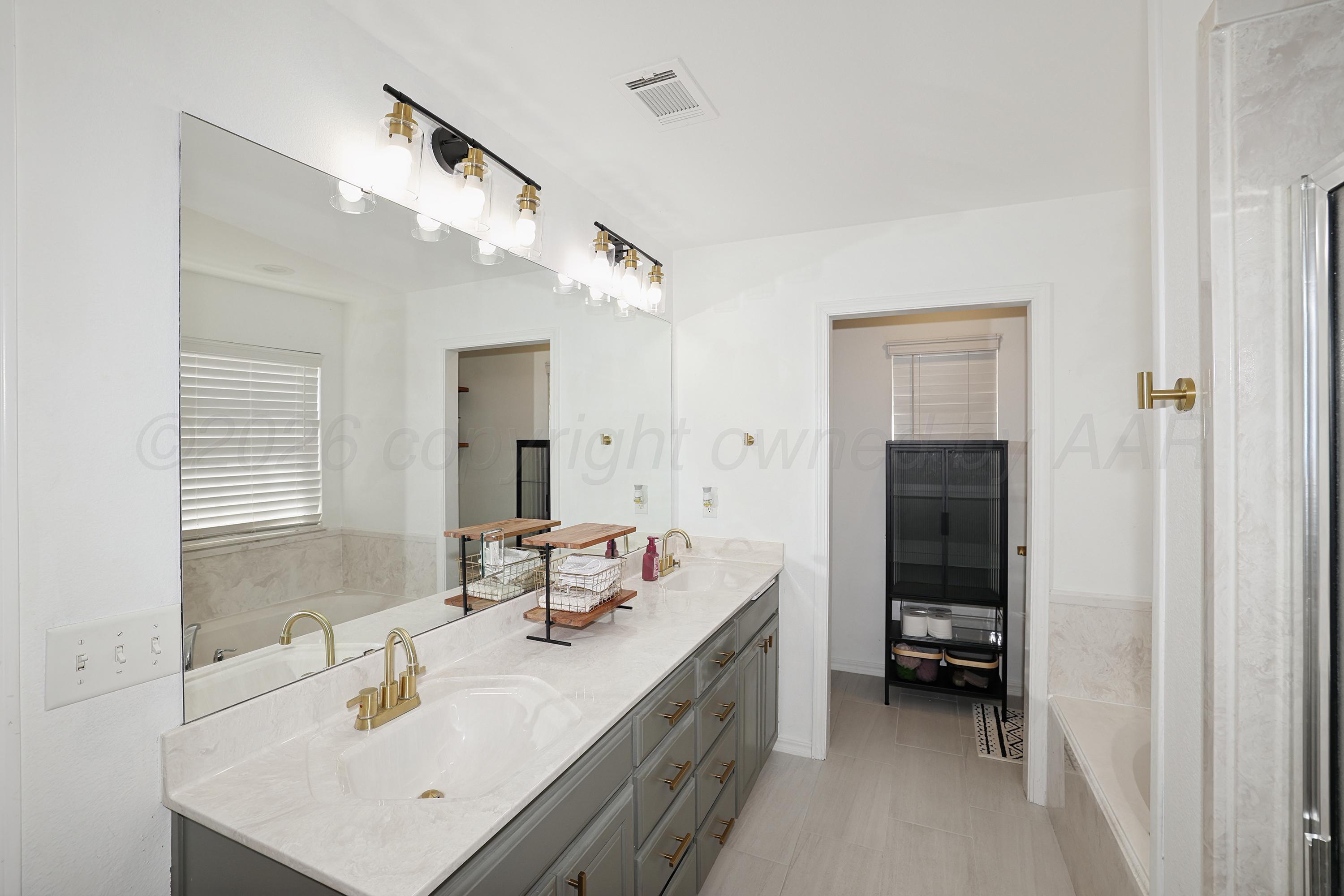 1401 Southwest 61st Avenue Amarillo, TX 79118 - Photo 8 of 31 13-Primary Bath