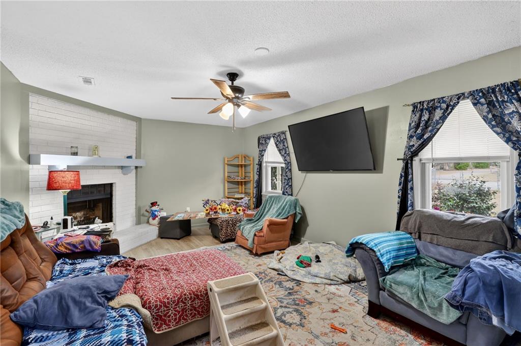 2112 Moncrieff Street Augusta, GA 30906 - Photo 4 of 22 a living room with furniture a flat screen tv and a window