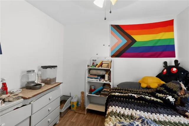 a bed room with a bed and a window