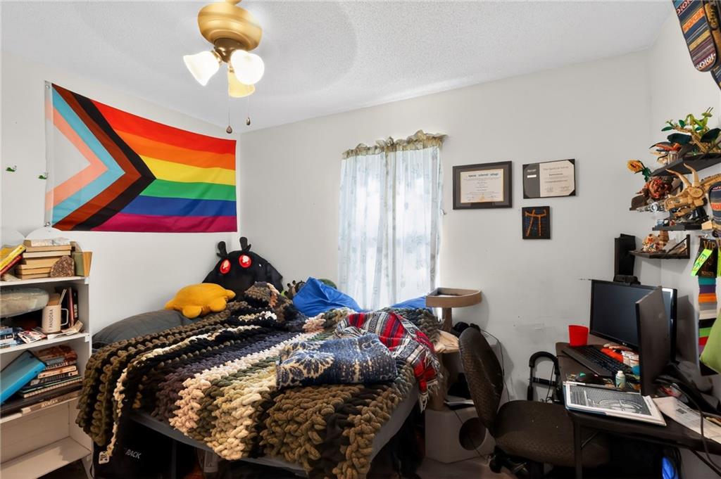 2112 Moncrieff Street Augusta, GA 30906 - Photo 10 of 22 a bed room with a bed and a window