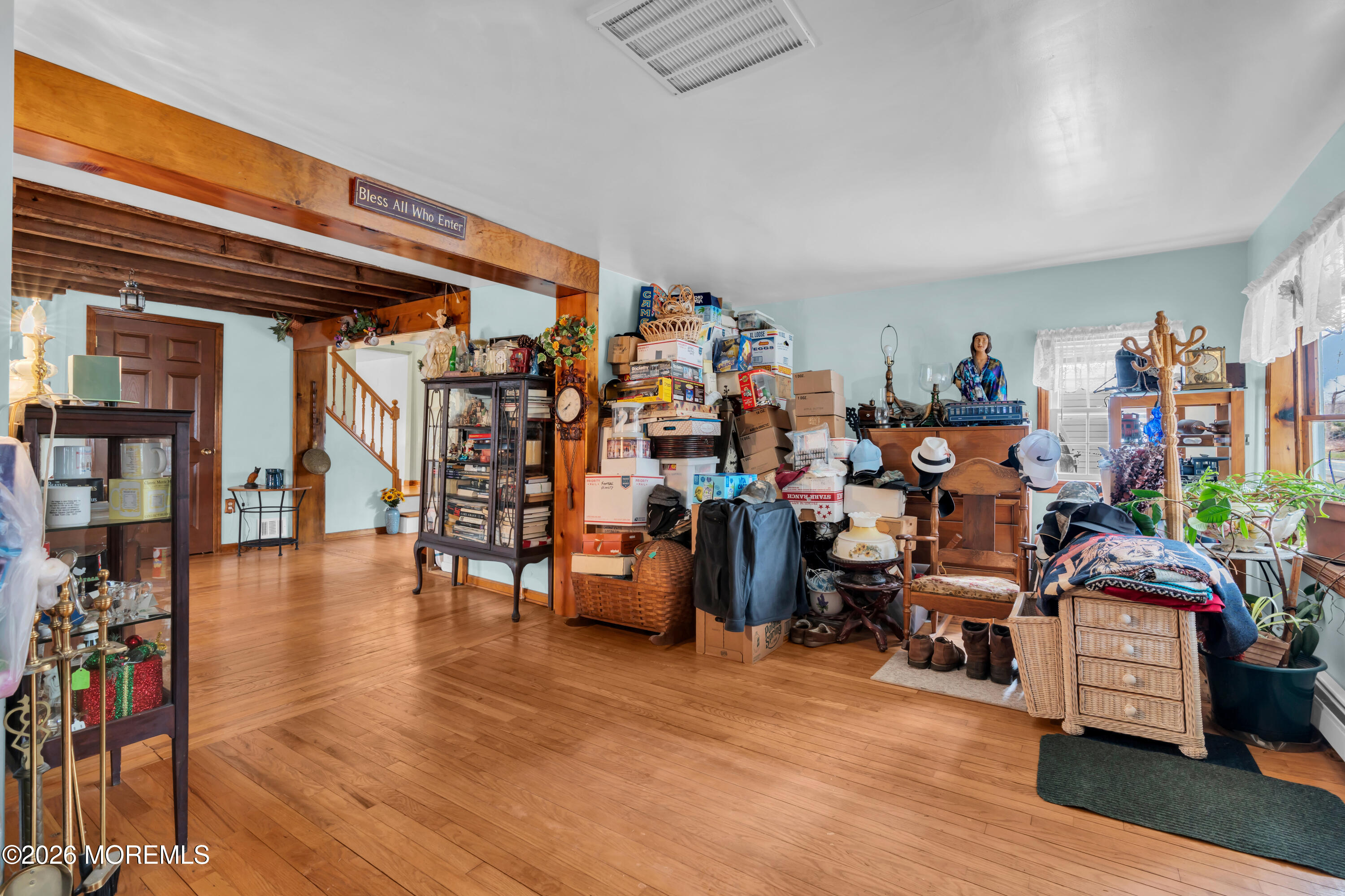 267 Phalanx Road Colts Neck, NJ 07722 - Photo 11 of 36 a view of a room with lots of stuff and hardwood floor