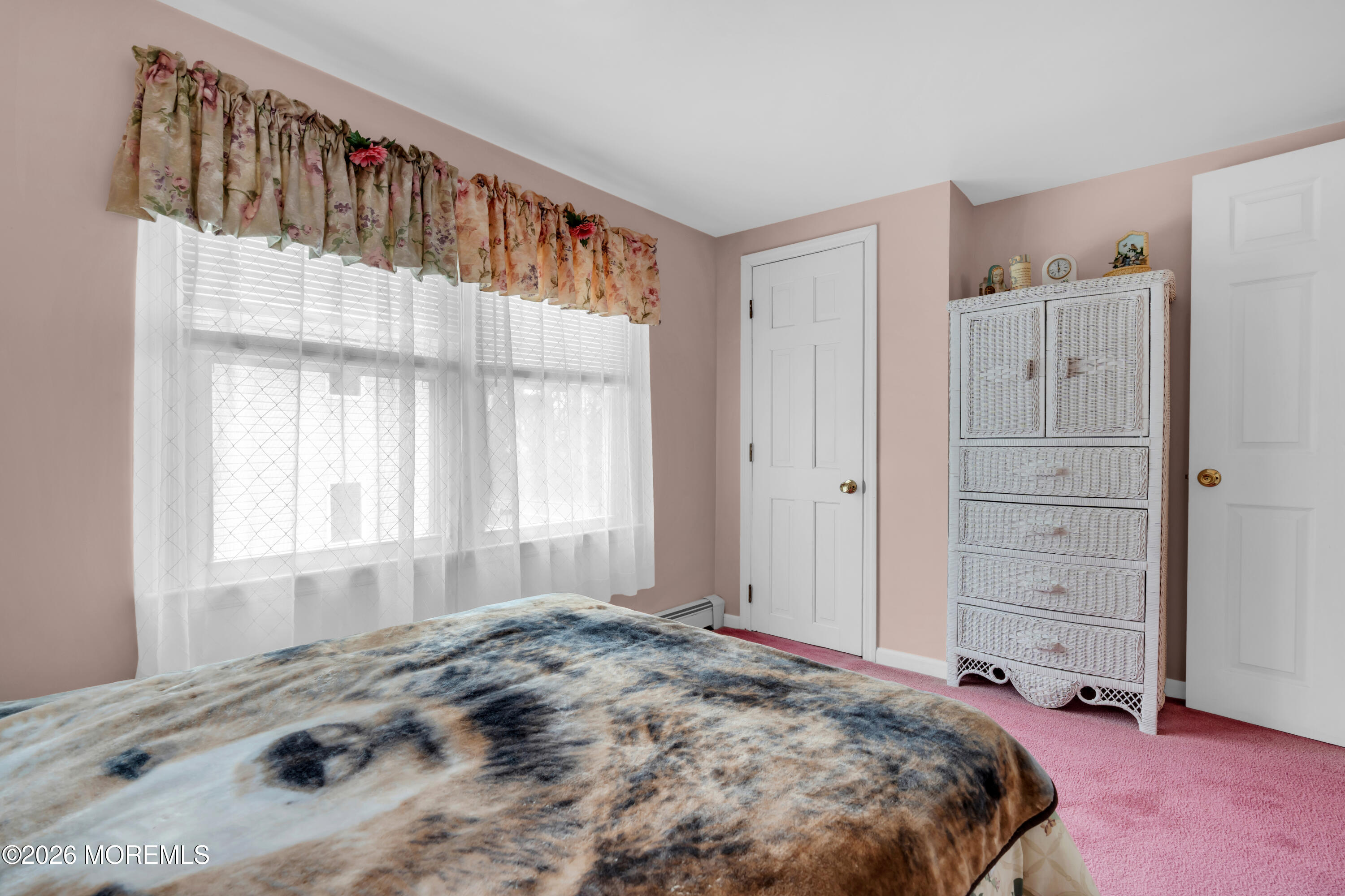 267 Phalanx Road Colts Neck, NJ 07722 - Photo 21 of 36 a bedroom with a bed and a window