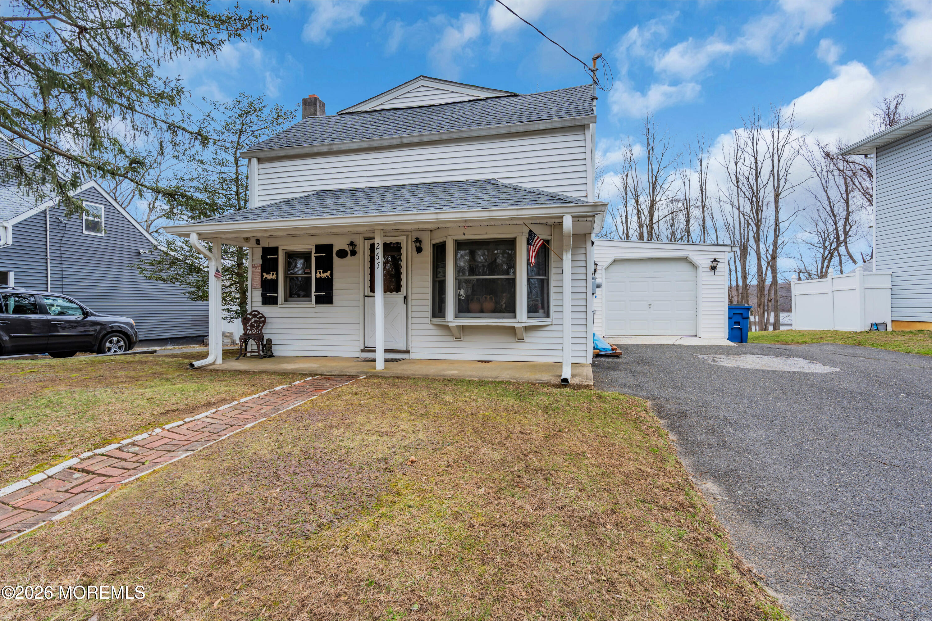 267 Phalanx Road Colts Neck, NJ 07722 - Photo 33 of 36 a view of a house with a outdoor space