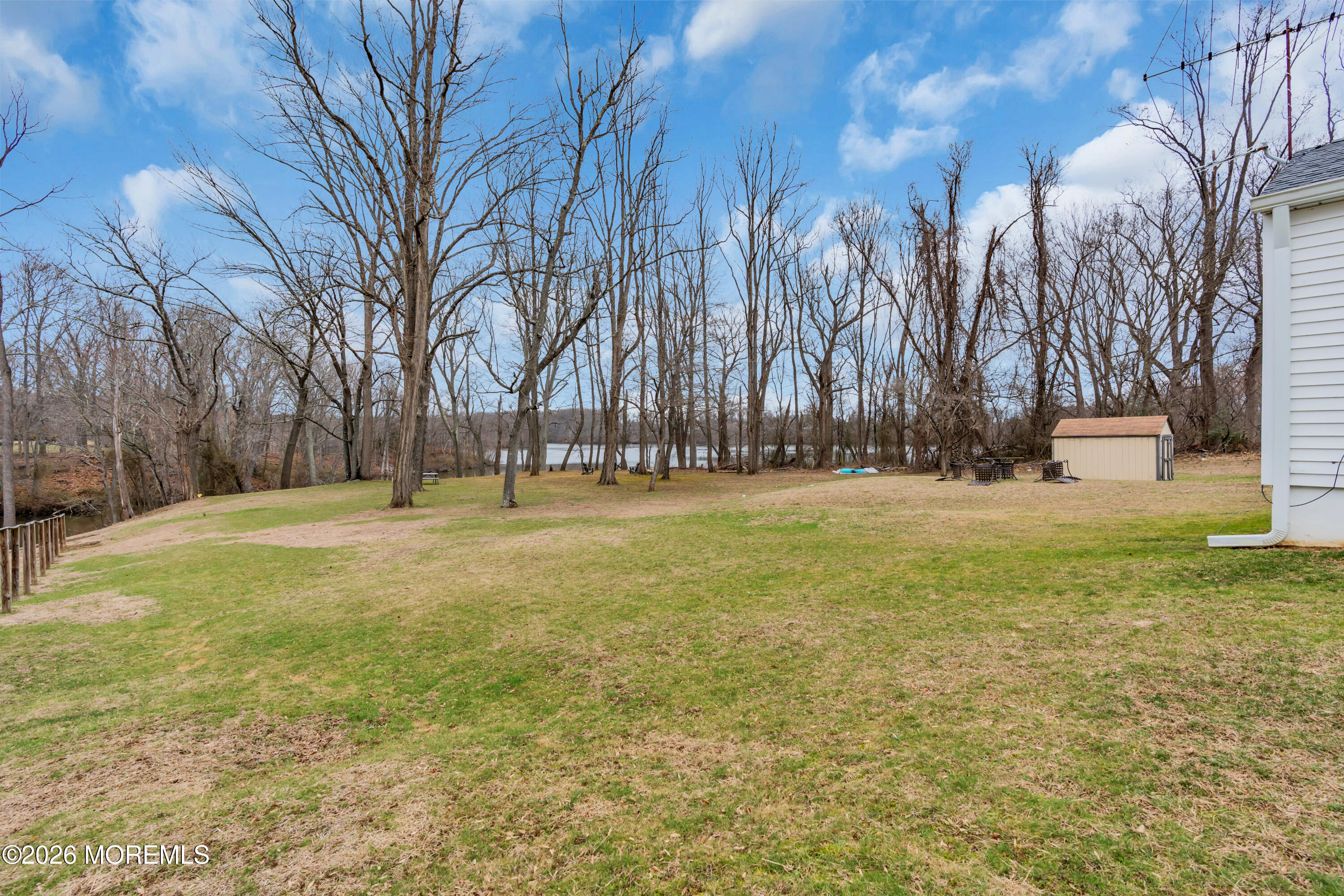 267 Phalanx Road Colts Neck, NJ 07722 - Photo 7 of 36 a view of yard with green space