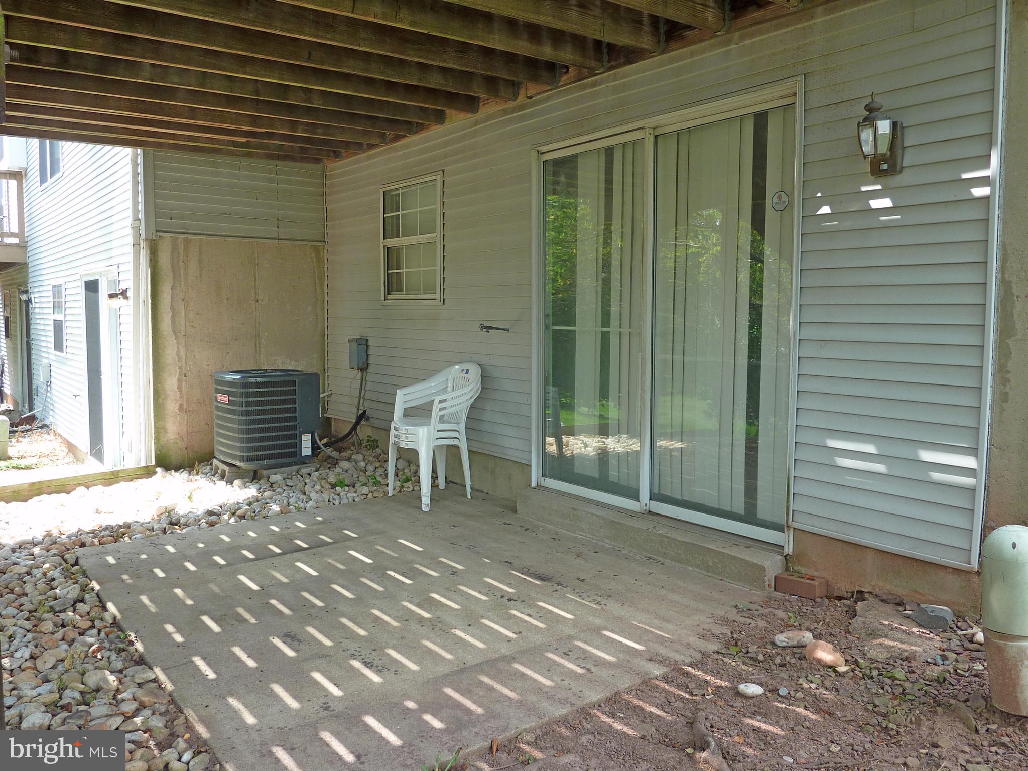 1026 Rafter Road Jeffersonville, PA 19403 - Photo 24 of 27 Rear Patio and Sliders to Lower Level Basement