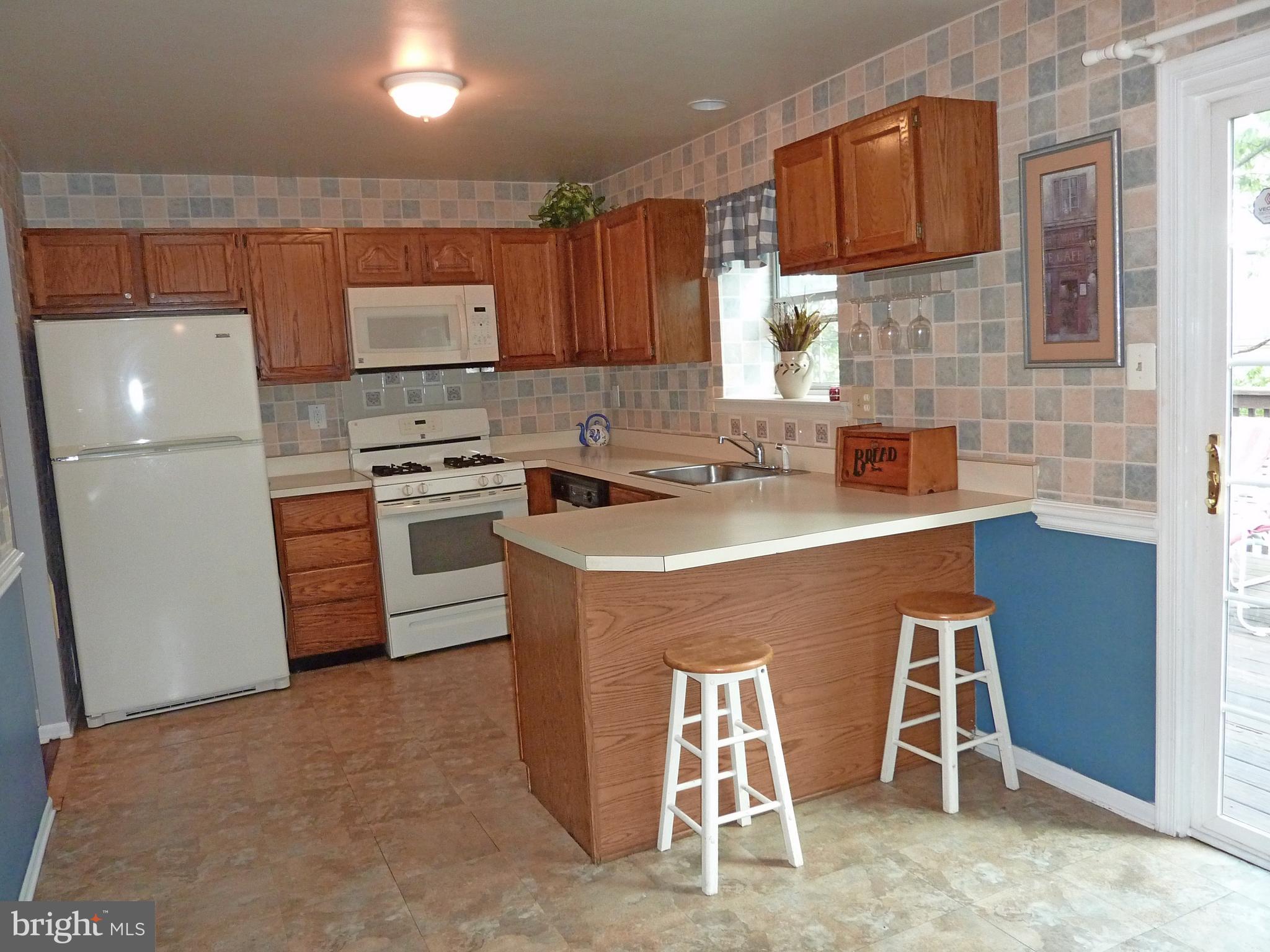 1026 Rafter Road Jeffersonville, PA 19403 - Photo 6 of 27 KItchen- Open & Cheerful