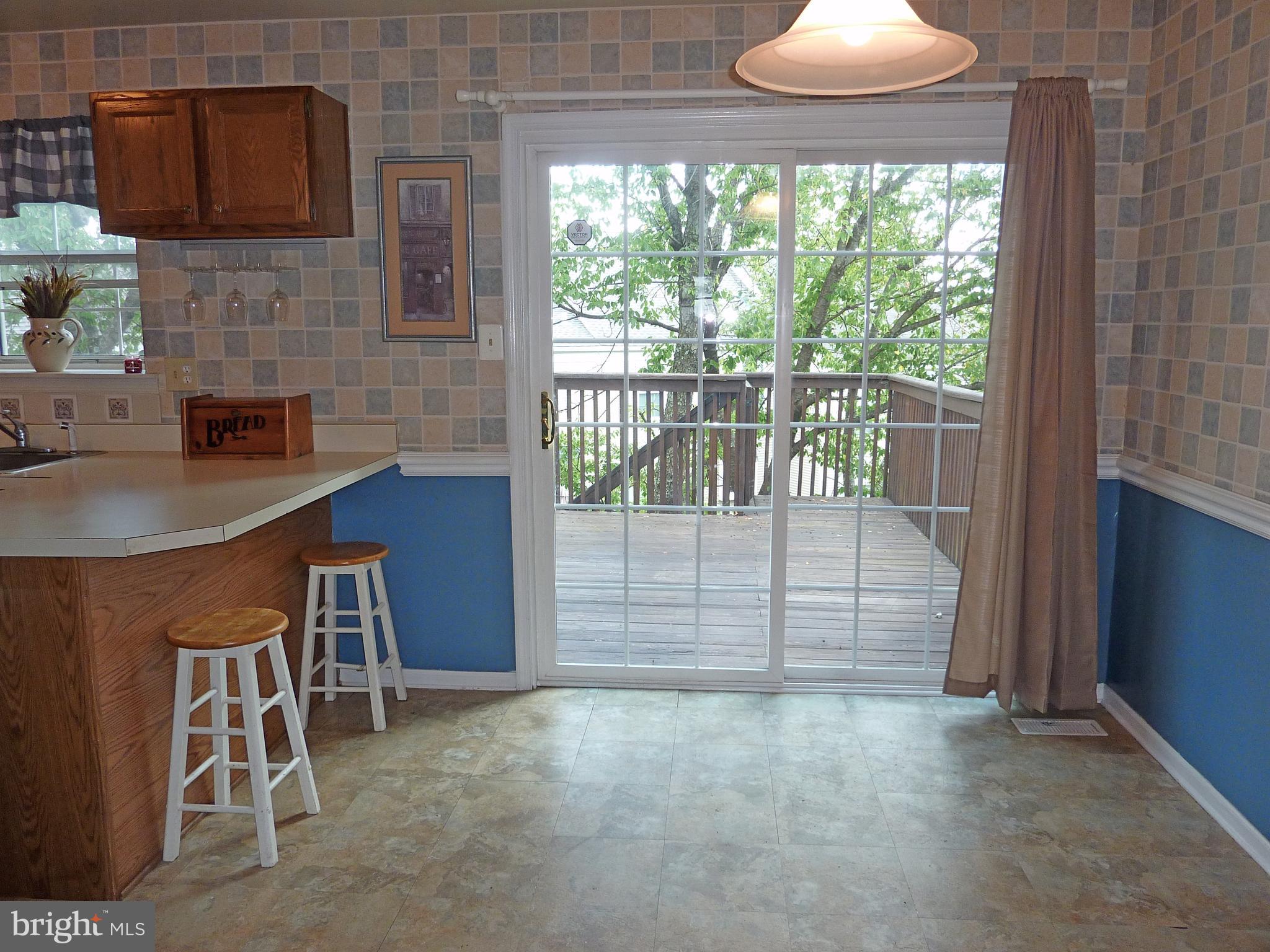 1026 Rafter Road Jeffersonville, PA 19403 - Photo 7 of 27 Kitchen Dining Area & Pella Sliders to Deck !