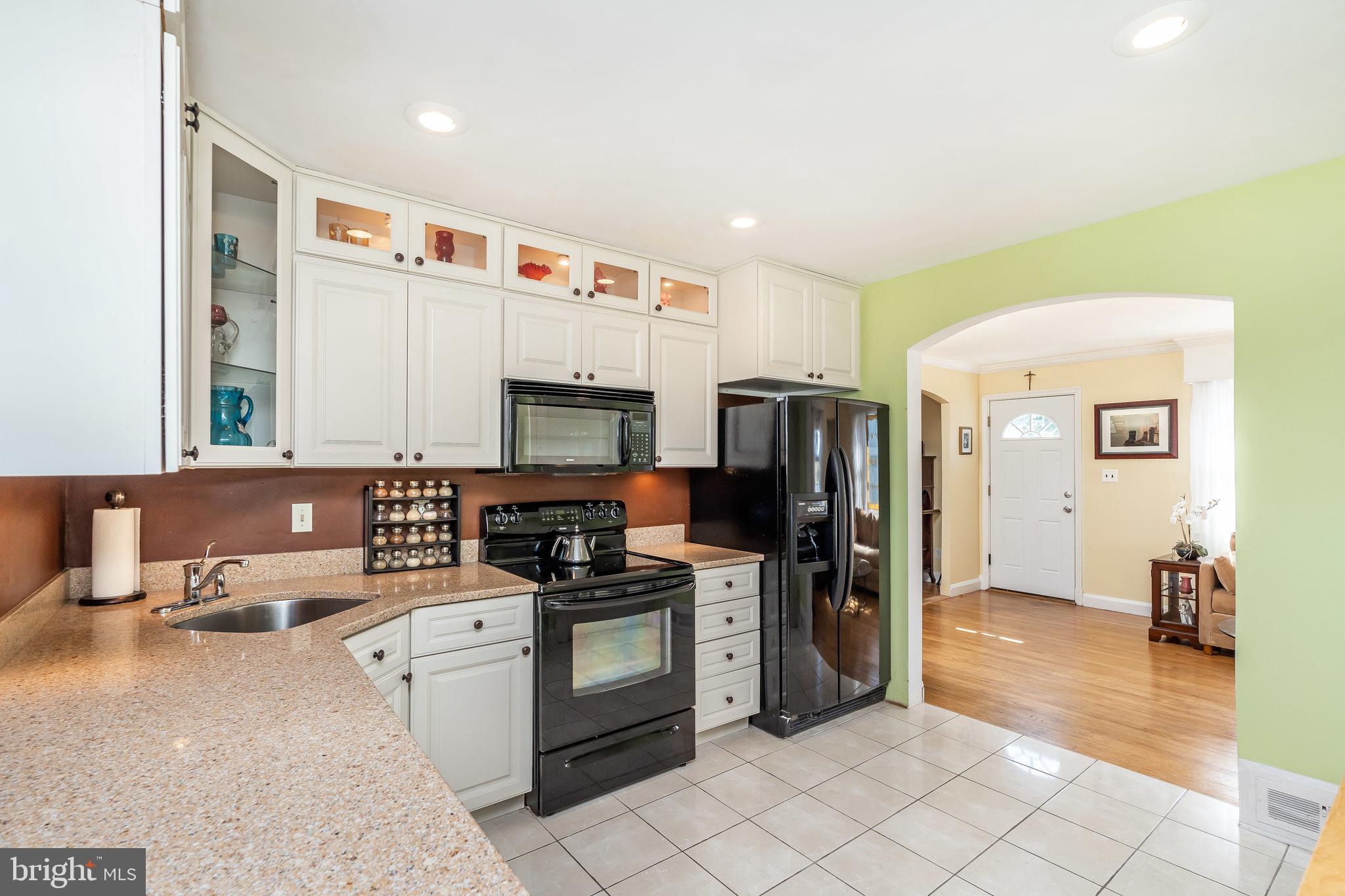1250 June Road Baltimore, MD 21227 - Photo 9 of 42 Granite counter tops. Ceramic tile floor