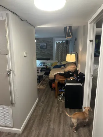 a room with furniture and a window
