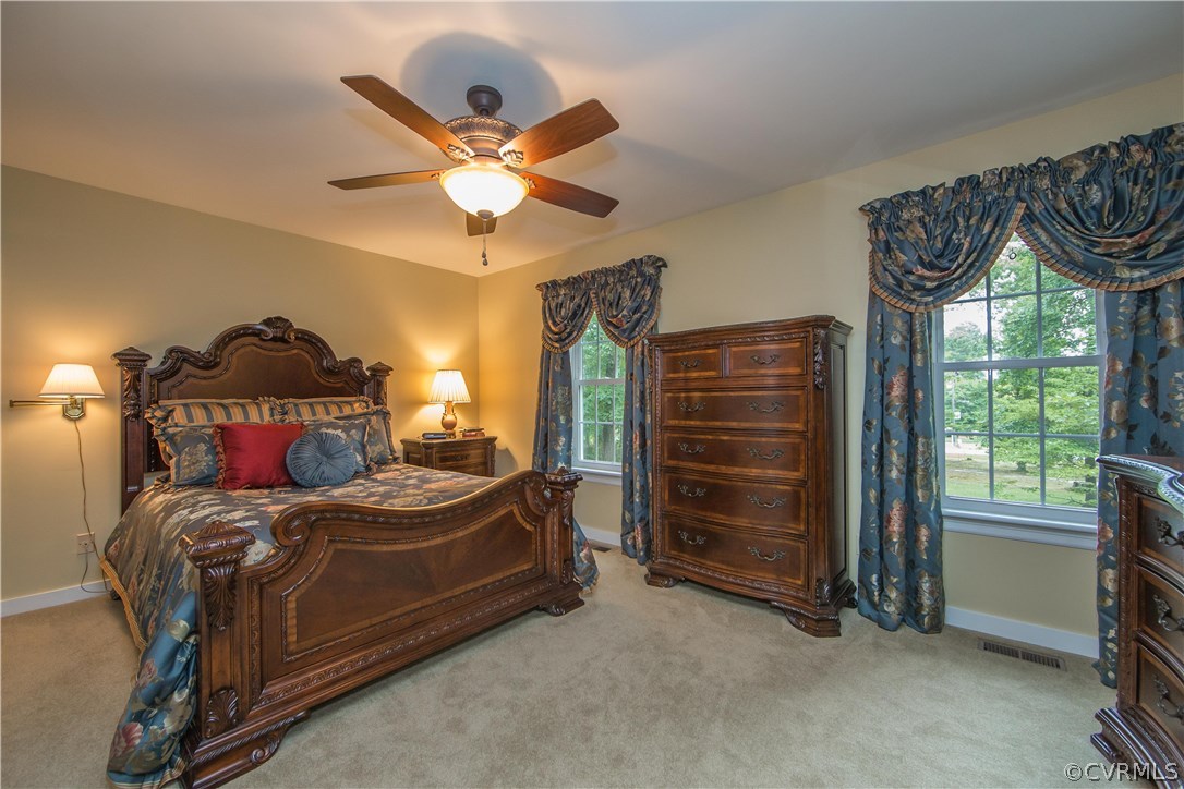 12941 Spring Run Road Midlothian, VA 23112 - Photo 27 of 48 a bedroom with a bed and a window