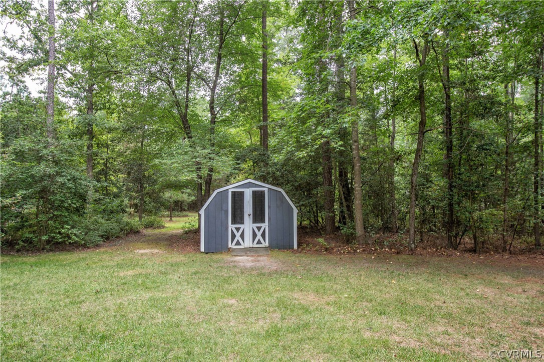 12941 Spring Run Road Midlothian, VA 23112 - Photo 40 of 48 a house view with a backyard space