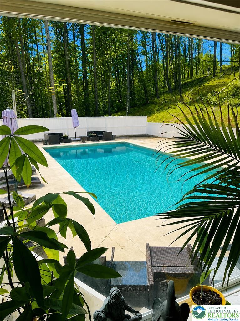 135 Haney Road Kunkletown, PA 18058 - Photo 18 of 53 a view of a swimming pool with a yard
