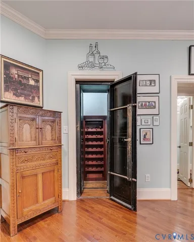 a view of a refrigerator in kitchen and wooden floor