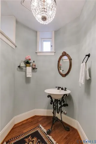 a utility room with cabinets washer and dryer