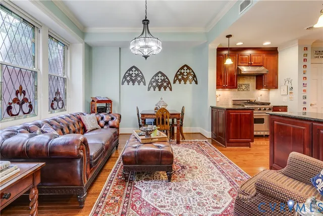 a living room with furniture and a table