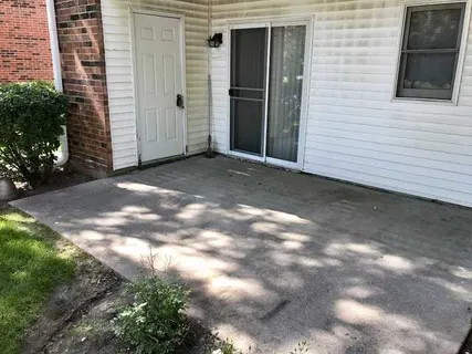 a view of backyard of a house