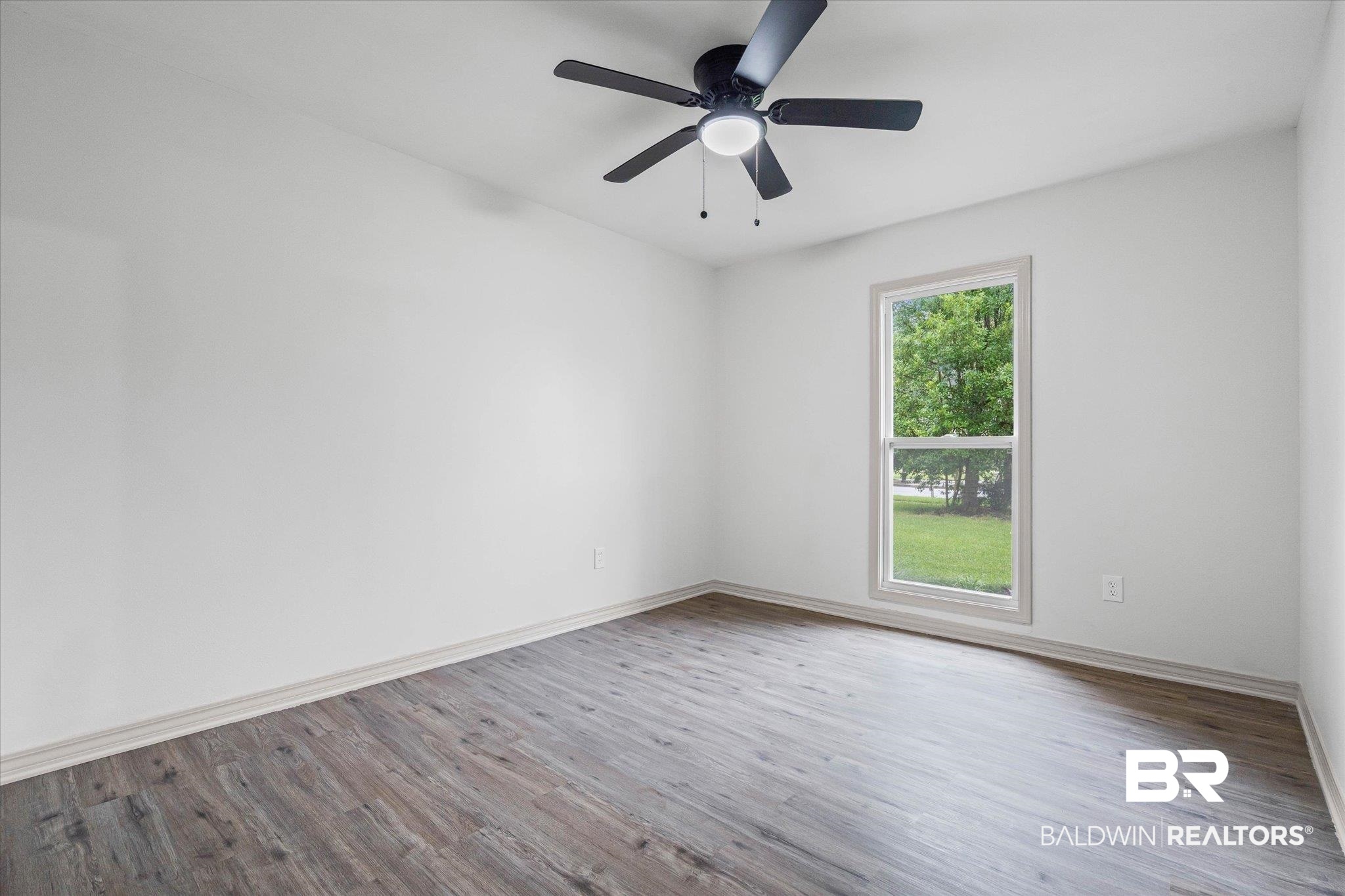 3655 Claridge Road South Mobile, AL 36608 - Photo 19 of 32 Empty room featuring light wood-style flooring and a ceiling fan