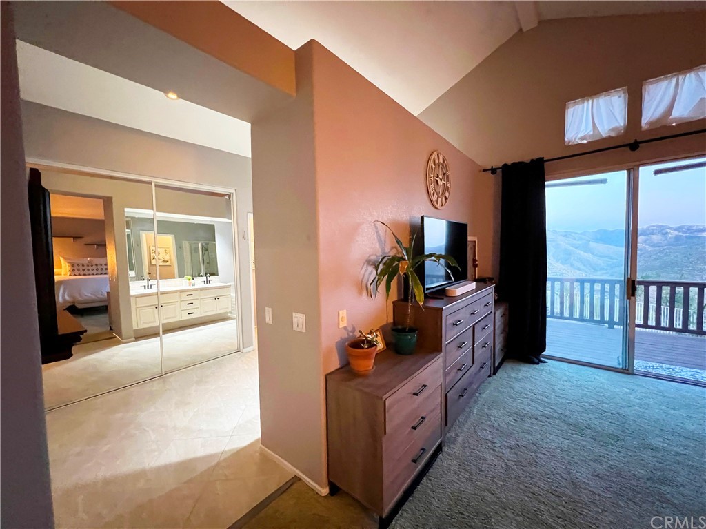43 Corte Rivera Lake Elsinore, CA 92532 - Photo 19 of 32 a living room with furniture and a flat screen tv