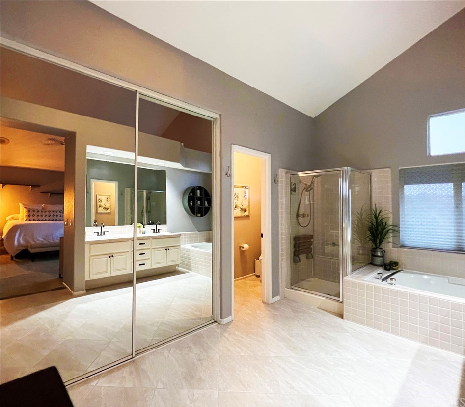 43 Corte Rivera Lake Elsinore, CA 92532 - Photo 20 of 32 a large spacious bathroom with a large tub and shower