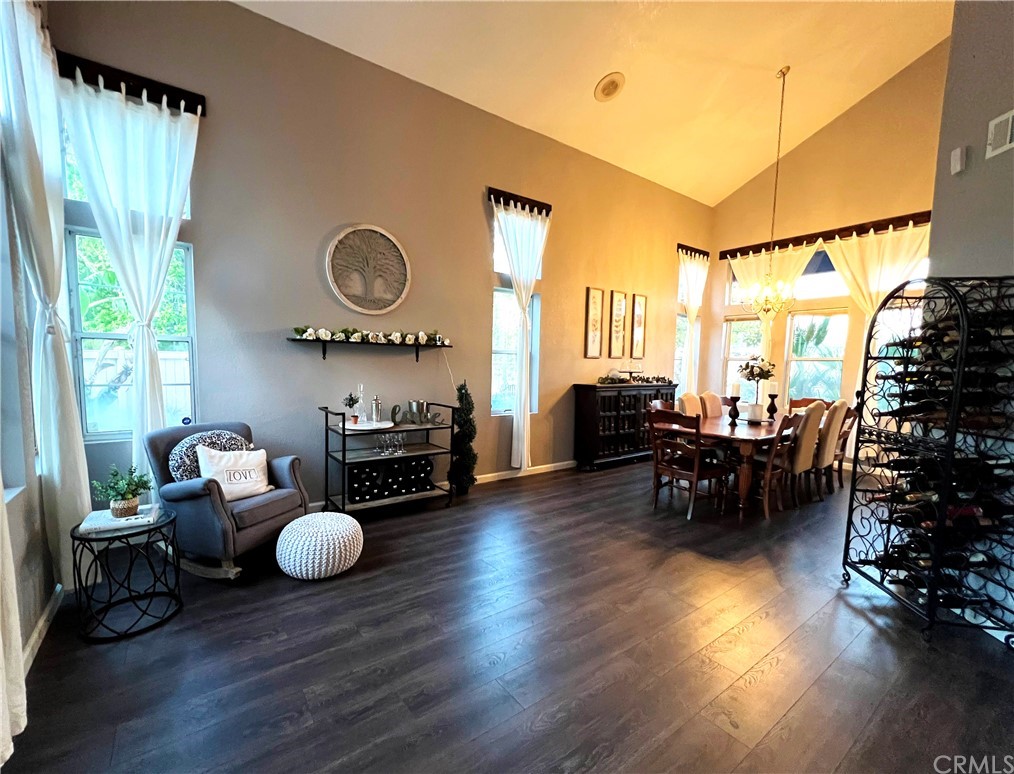 43 Corte Rivera Lake Elsinore, CA 92532 - Photo 7 of 32 a living room with furniture and a wooden floor