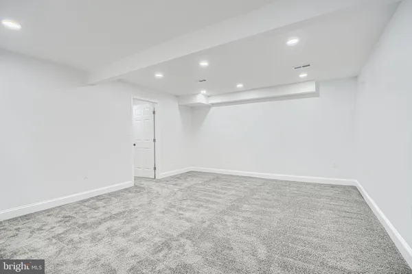 an empty room with a empty space and window