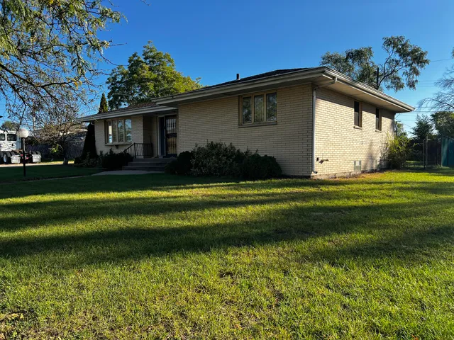 a view of a house with a swimming pool