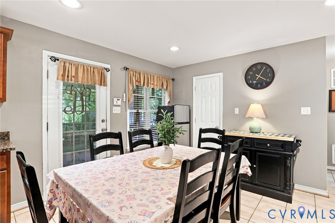 6401 Poplar Road Quinton, VA 23141 - Photo 10 of 46 Dining area with neutral wall color and recessed l