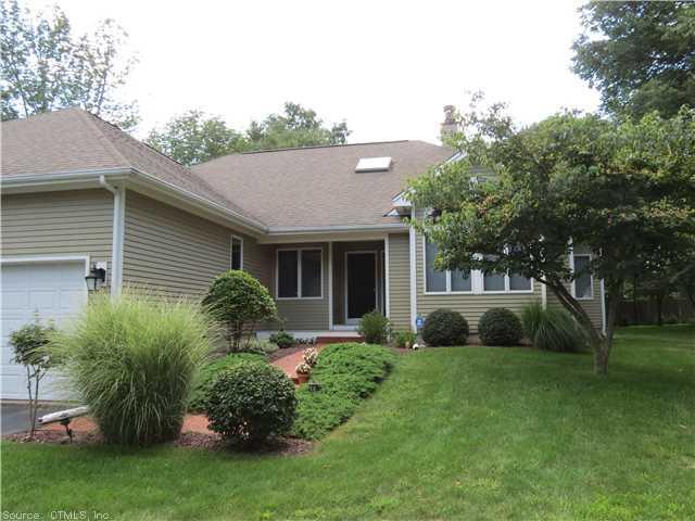 6 Juggernaut Road Prospect, CT 06712 - Photo 1 of 1 a view of a house with a garden and plants