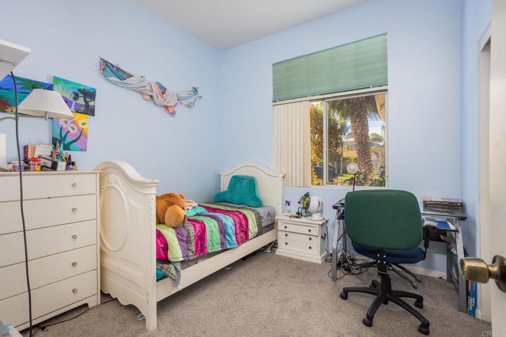 4895 Lake Shore Place Fallbrook, CA 92028 - Photo 11 of 27 a bedroom with a bed and a window