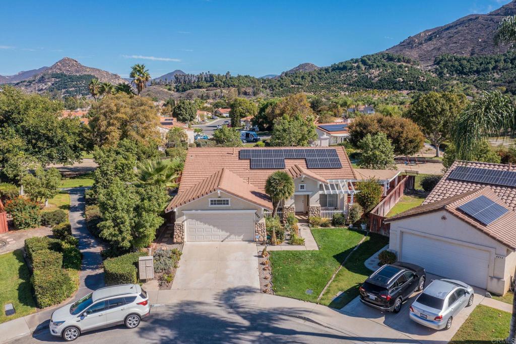 4895 Lake Shore Place Fallbrook, CA 92028 - Photo 22 of 27 a view of a house with a yard