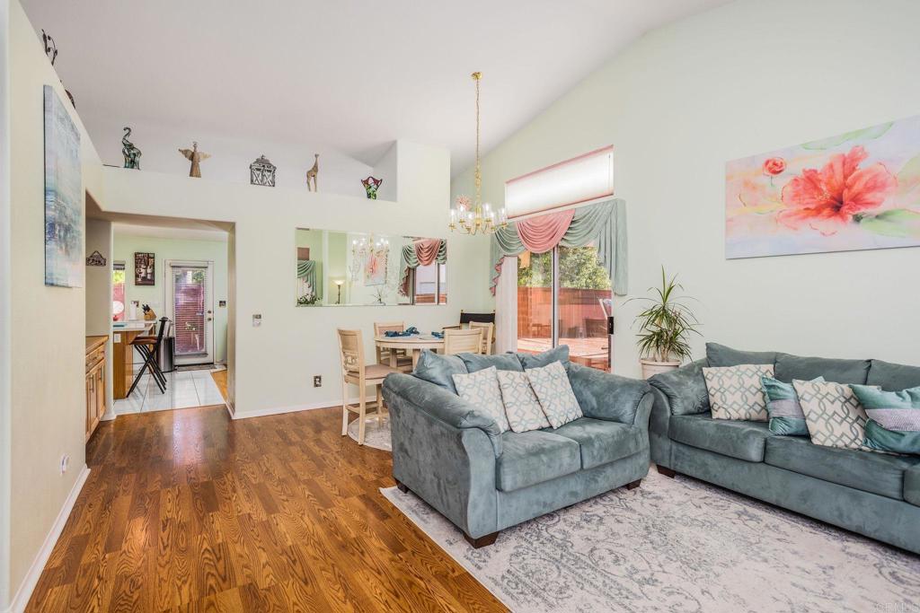 4895 Lake Shore Place Fallbrook, CA 92028 - Photo 3 of 27 a living room with furniture and wooden floor