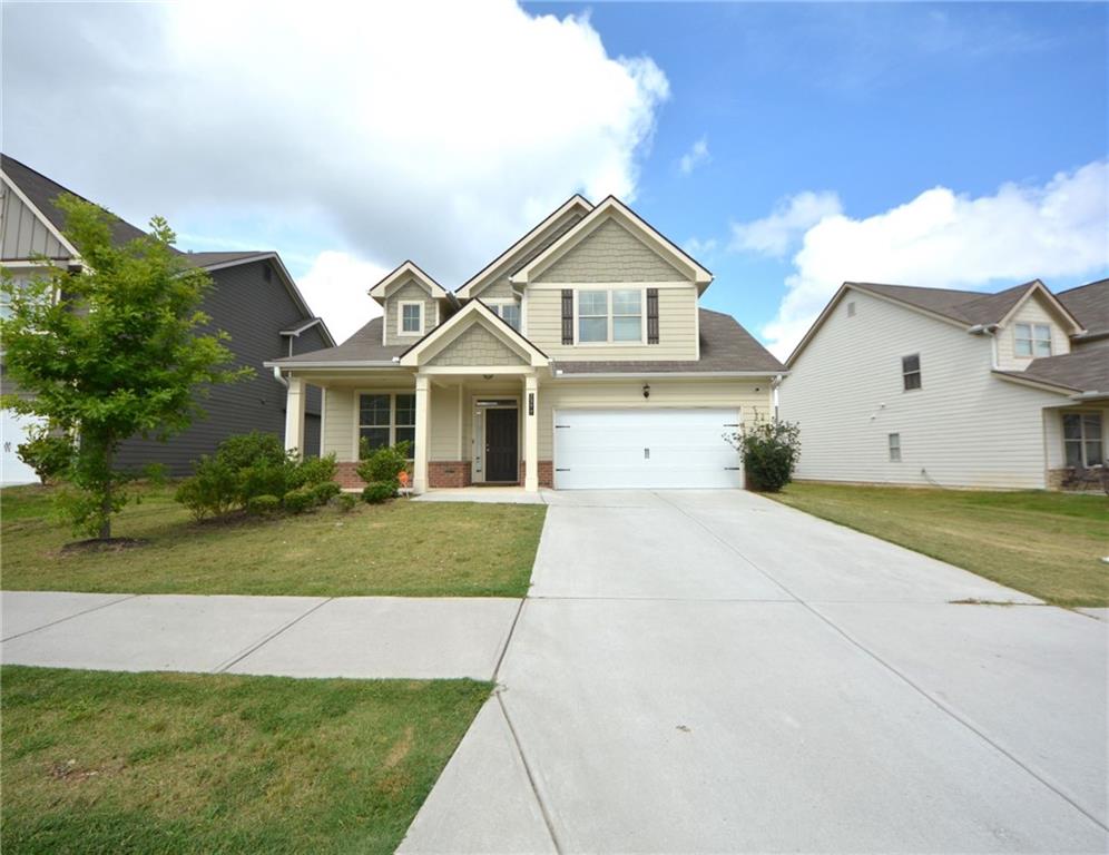 2377 Ticonic Road Lithonia, GA 30058 - Photo 2 of 40 a view of house with yard and green space