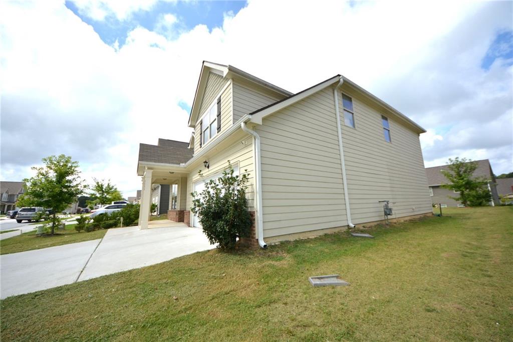 2377 Ticonic Road Lithonia, GA 30058 - Photo 3 of 40 a view of a backyard of the house