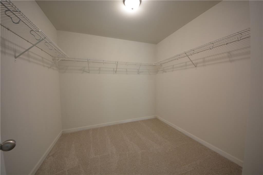 2377 Ticonic Road Lithonia, GA 30058 - Photo 33 of 40 a view of a room with racks on the wall