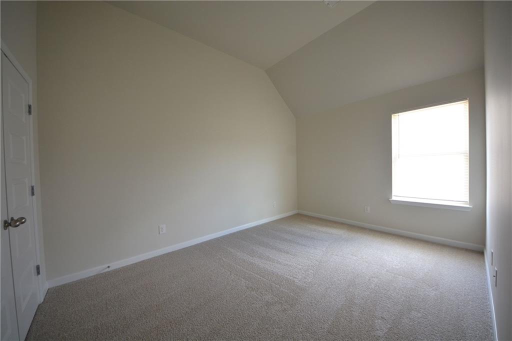 2377 Ticonic Road Lithonia, GA 30058 - Photo 34 of 40 an empty room with a window