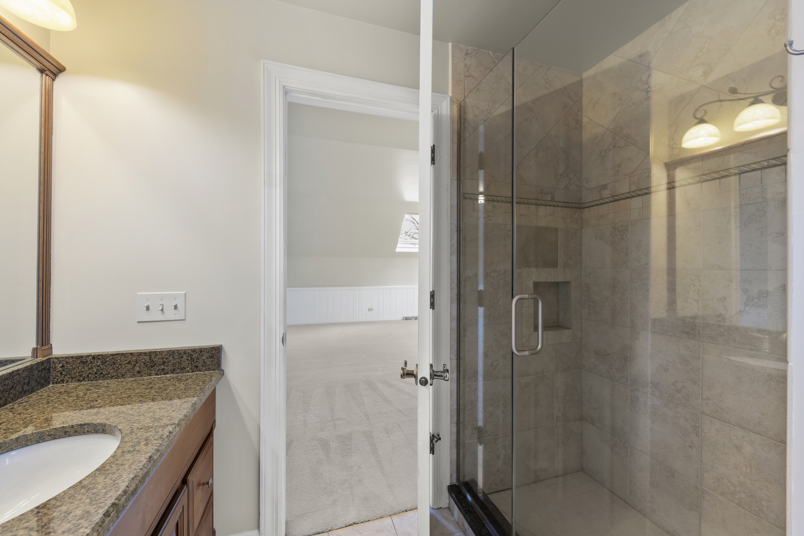 1S151 Winfield Road Wheaton, IL 60189 - Photo 46 of 73 a bathroom with a granite countertop shower sink vanity and mirror