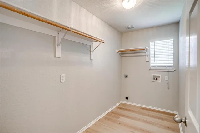 a view of small space with racks on the wall