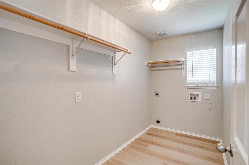 543 Thistle Meade Circle Burleson, TX 76028 - Photo 16 of 23 a view of small space with racks on the wall